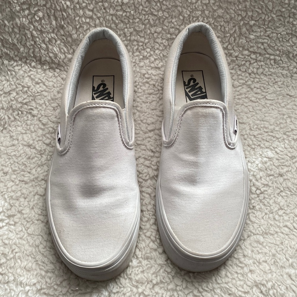 All white slip-on vans